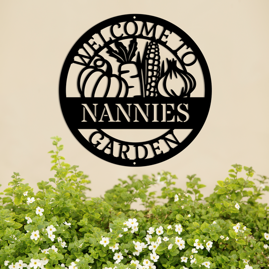 a metal sign that says welcome to nannies garden