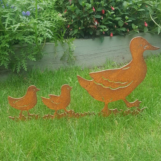 Rusted Metal Duck And Ducklings