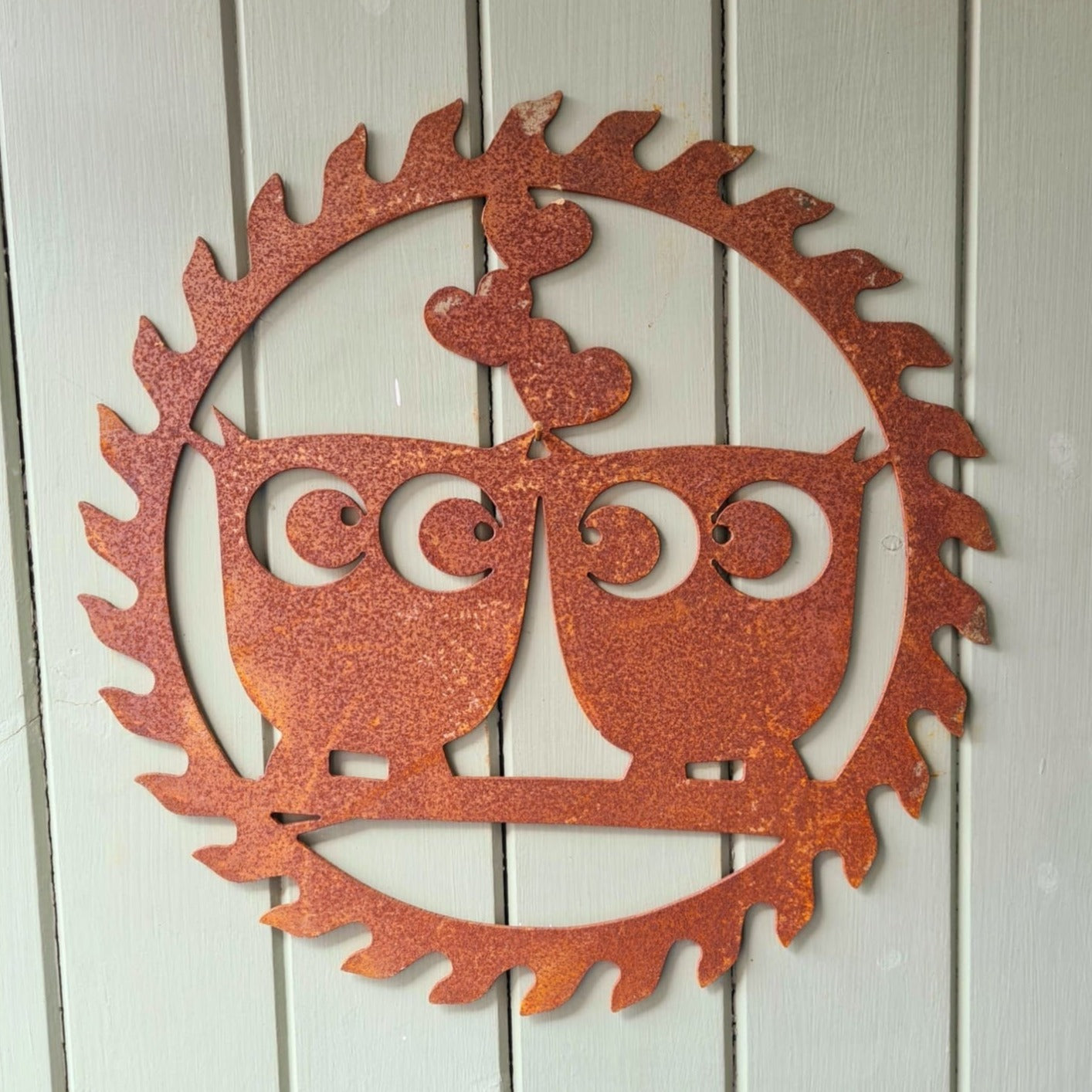Rusted Metal Owls Kissing