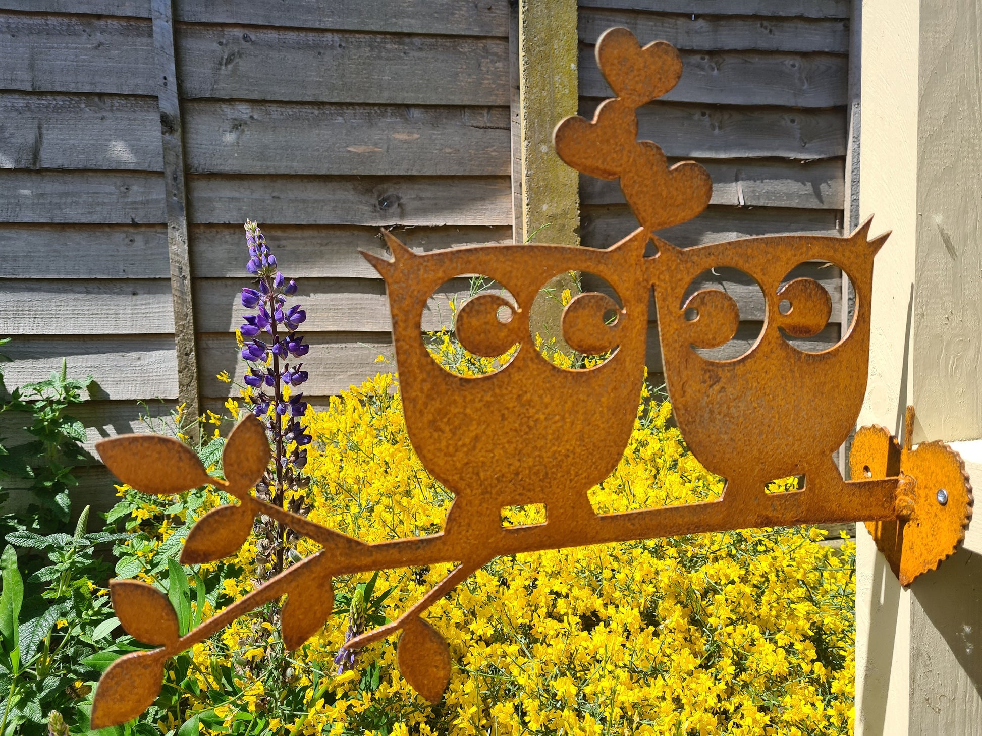 Rusted Metal Owls Kissing