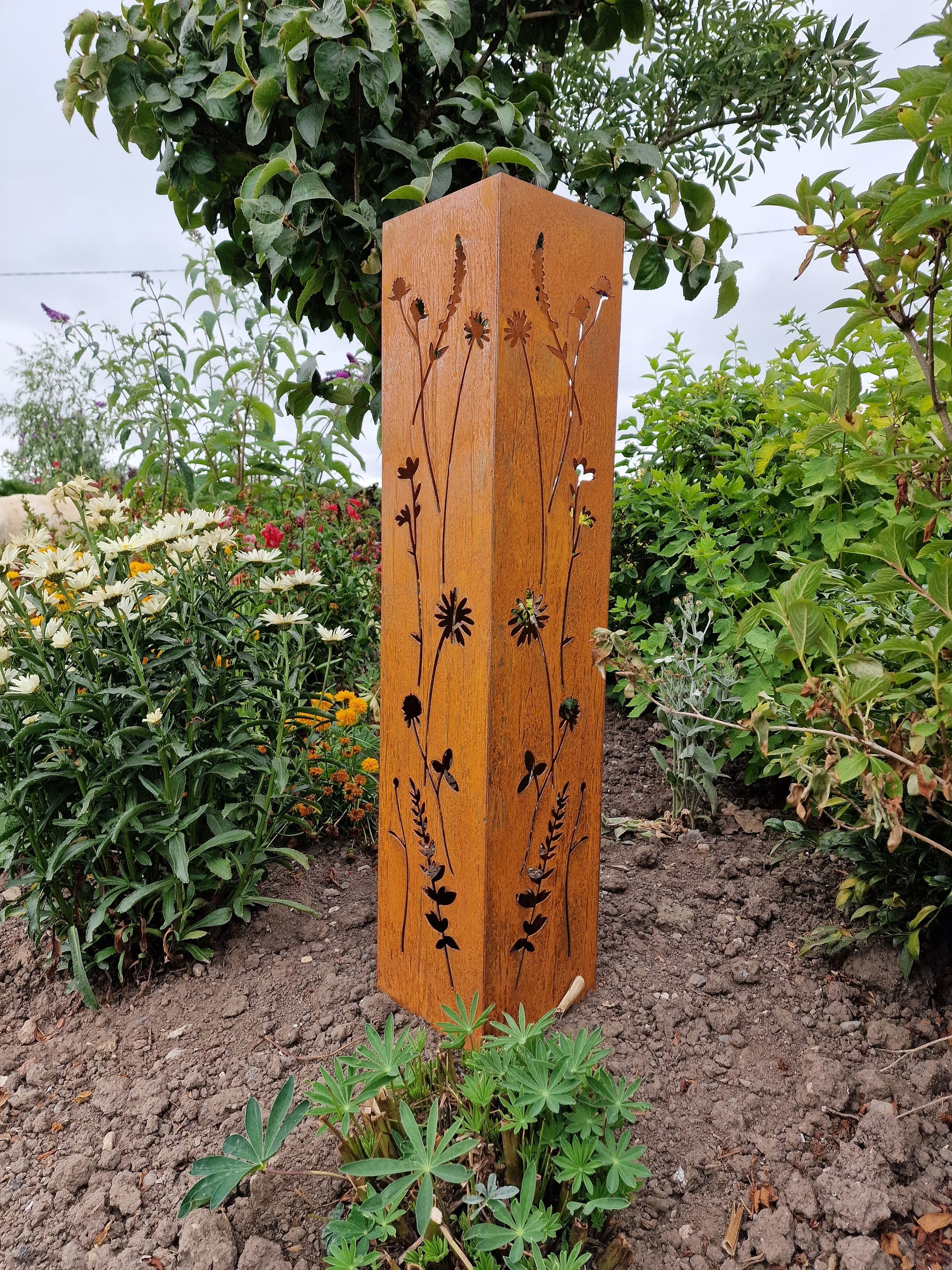 Rusted Metal Wildflower Oblong Statue